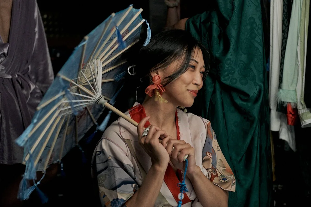 Tergel smiling with parasol
