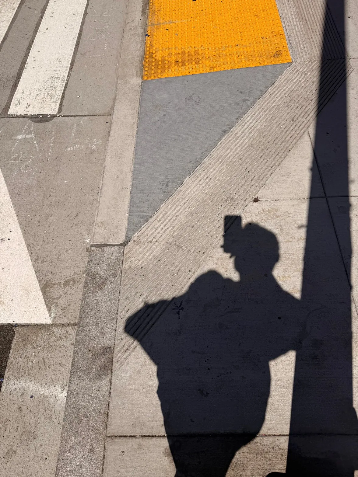 Body shadow on mixed urban floor surfaces