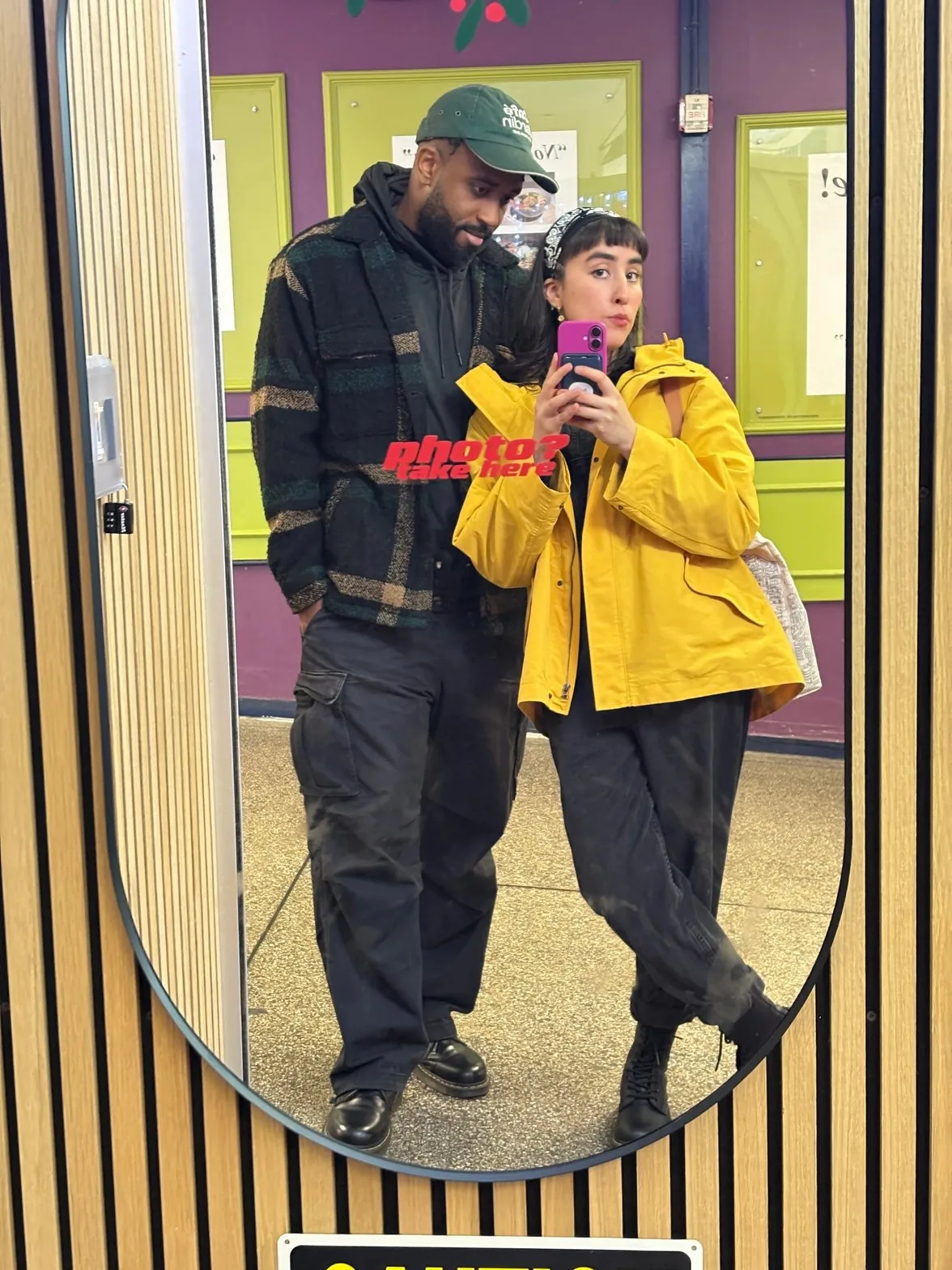 Lucero and friend mirror selfie in office