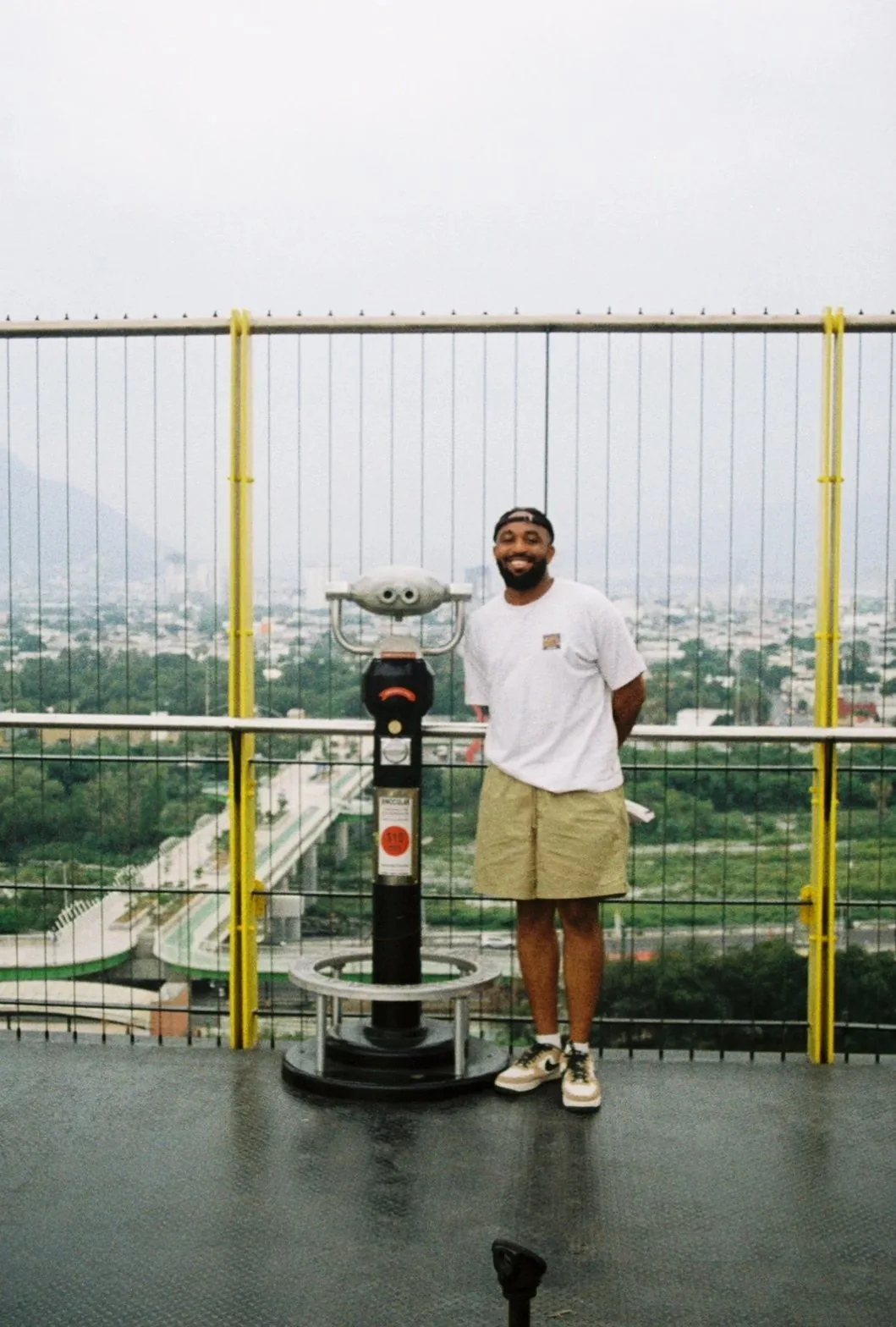 Uko at observation deck with yellow beams