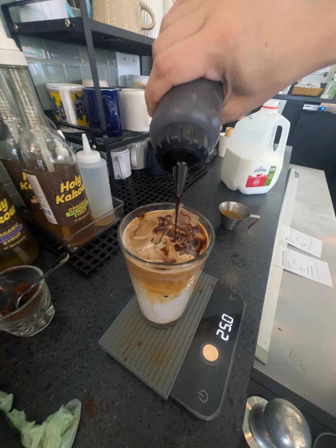 Ben pouring chocolate sauce
