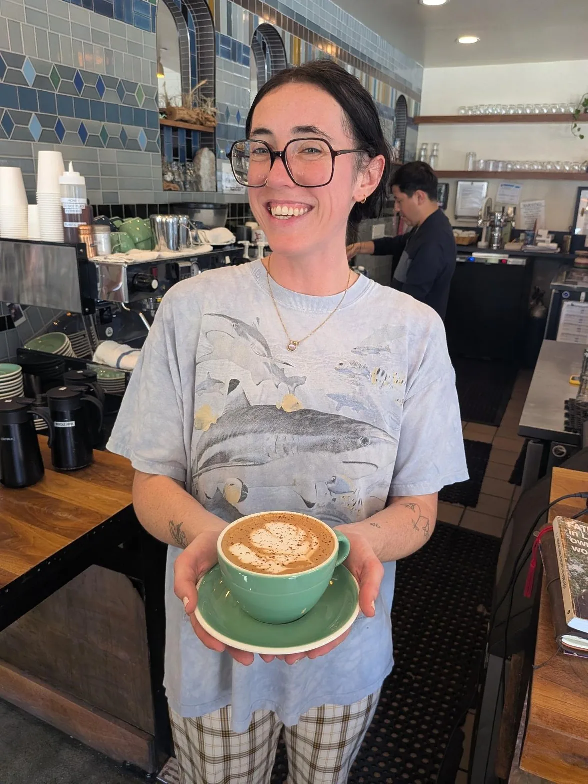 Michaela smiling with finished mocha